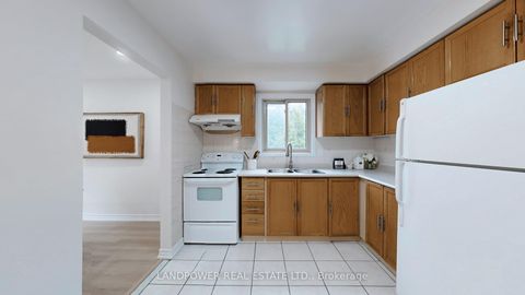 Photo 12 at 64 - 10 Cardwell Avenue, Malvern West, Toronto