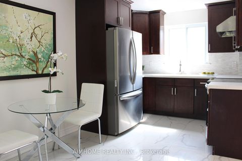 Photo 6 at 2311 Bridletowne Circle, L'Amoreaux, Toronto