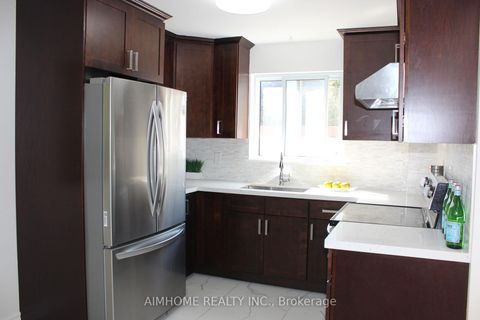 Photo 9 at 2311 Bridletowne Circle, L'Amoreaux, Toronto