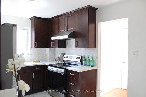 Photo 10 at 2311 Bridletowne Circle, L'Amoreaux, Toronto