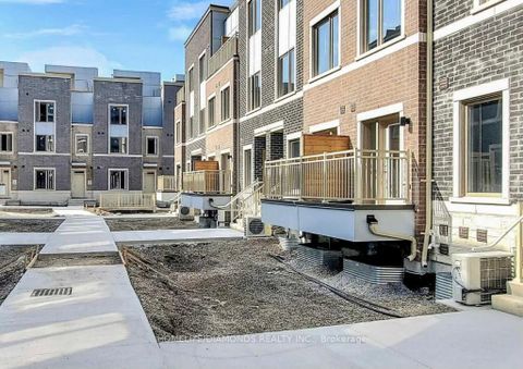 Photo 1 at 68 - 31 HONEYCRISP Crescent E, Vaughan Corporate Centre, Vaughan