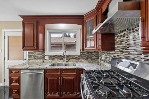 Photo 11 at 46 Tidefall Drive, L'Amoreaux, Toronto