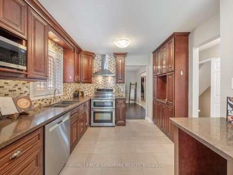 Photo 12 at 28 Bowes Garden Court, Rouge E10, Toronto