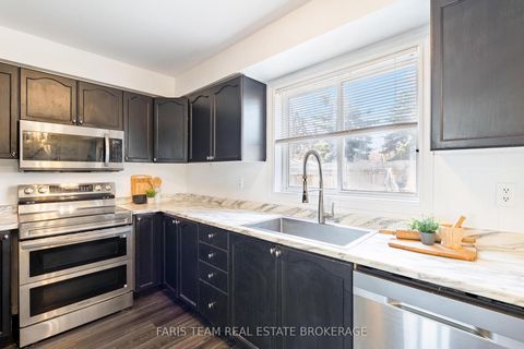 Photo 4 at 203 Thrushwood Drive, 400 West, Barrie