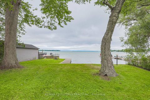 Photo 1 at 128 Moores Beach Road, Virginia, Georgina