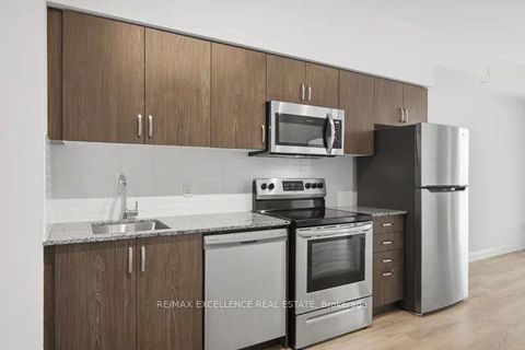 Photo 5 at 309 - 10 Meadowglen Place, Woburn, Toronto