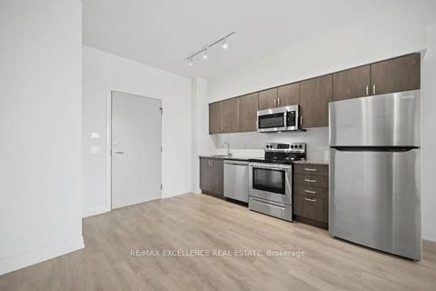 Photo 6 at 309 - 10 Meadowglen Place, Woburn, Toronto