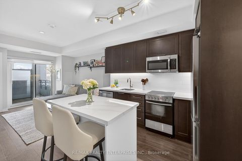 Photo 10 at 401 - 1 Neighbourhood Lane, Queensway, Toronto