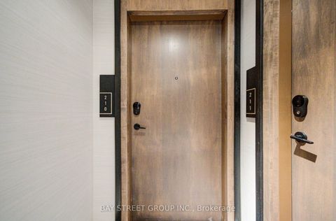 Photo 2 at 210 - 120 Eagle Rock Way, Rural Vaughan, Vaughan