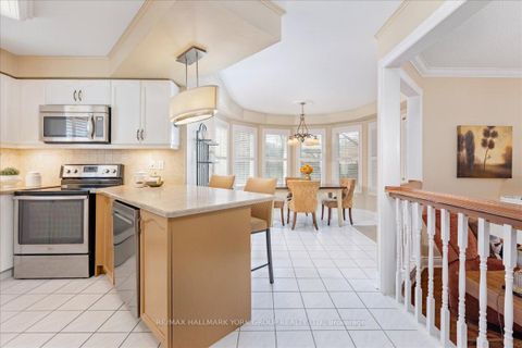 Photo 9 at 263 McClellan Way, Aurora Highlands, Aurora