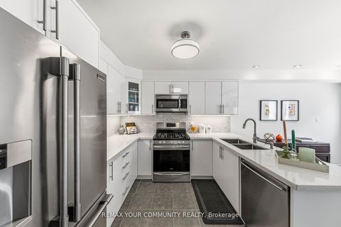 Photo 9 at 9 Cannes Circle, Junction Area, Toronto