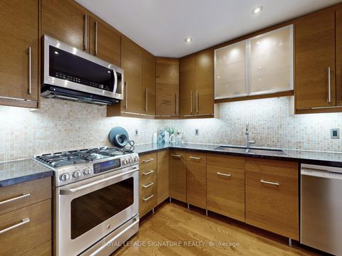 Photo 13 at 79 Meighen Avenue, Crescent Town, Toronto