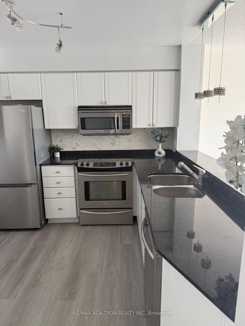 Photo 7 at 407 - 1131 Steeles Avenue W, Branson, Toronto