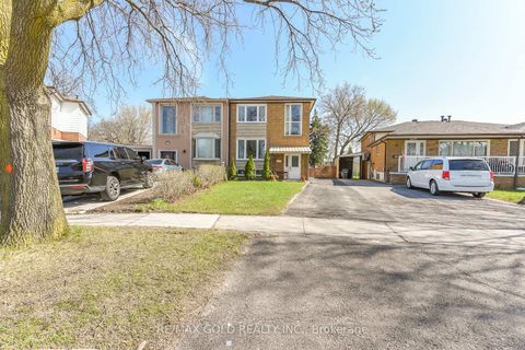 Photo 1 at 7464 Homeside Gardens, Malton, Mississauga