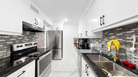 Photo 9 at 102 - 2825 Islington Avenue, Humber Summit, Toronto