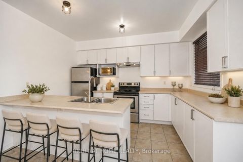Photo 4 at 48 Curran Hall Crescent, Morningside, Toronto