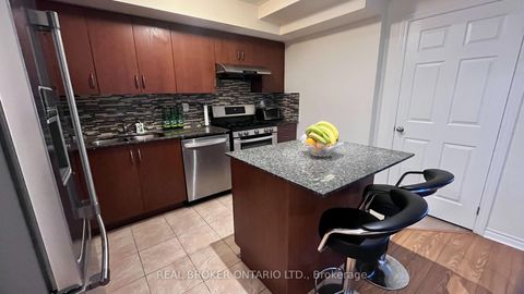 Photo 7 at 29 - 13 EATON PARK Lane, L'Amoreaux, Toronto