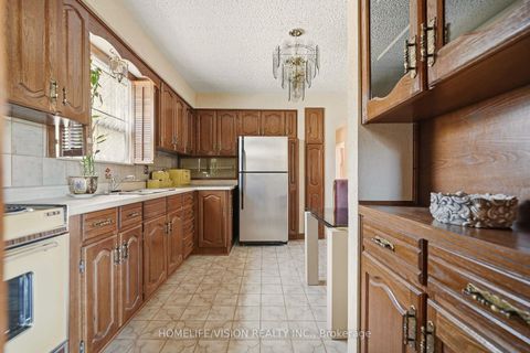 Photo 11 at 239 Epsom Downs Drive, CFB, Toronto