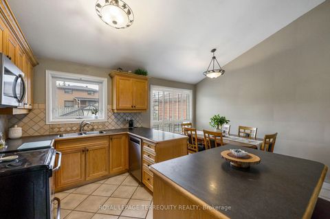 Photo 5 at 136 Strathburn Boulevard, Pelmo Park W5, Toronto