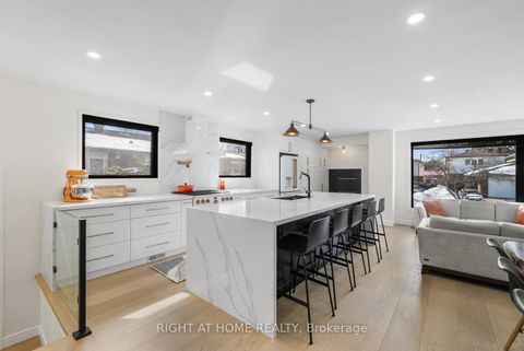 Photo 6 at 9 Thistlewaite Crescent, Malvern West, Toronto