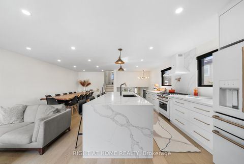 Photo 7 at 9 Thistlewaite Crescent, Malvern West, Toronto