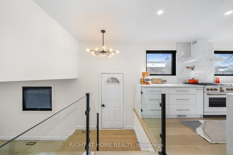 Photo 11 at 9 Thistlewaite Crescent, Malvern West, Toronto