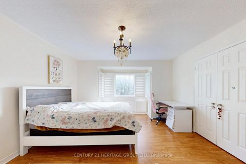 Photo 1 at 136 Cranberry Lane, Aurora Highlands, Aurora