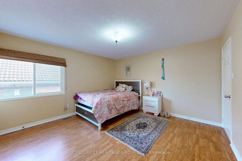 Photo 6 at 136 Cranberry Lane, Aurora Highlands, Aurora