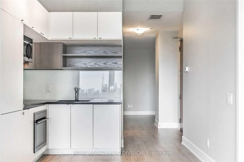 Photo 2 at 1408 - 111 St Clair Avenue W, St. Clair, Toronto