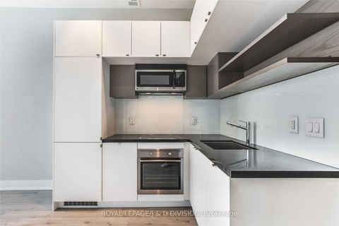 Photo 3 at 1408 - 111 St Clair Avenue W, St. Clair, Toronto