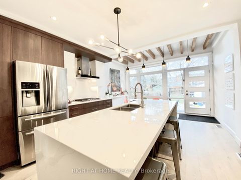 Photo 1 at 16 Woodlee Road, Danforth, Toronto