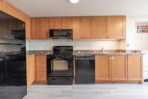 Photo 11 at 309 - 45 Strangford Lane, Birchmount, Toronto
