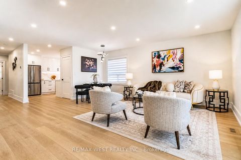 Photo 3 at 48 Lloyd Manor Road, Rosethorn, Toronto