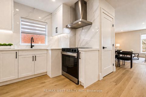 Photo 9 at 48 Lloyd Manor Road, Rosethorn, Toronto