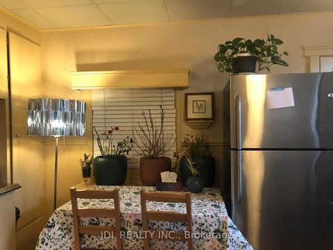 Photo 4 at 61 Guestville Avenue, Mount Dennis, Toronto