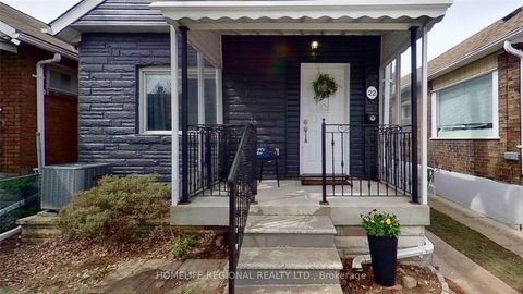 Photo 1 at 22 Criscoe Street, Smythe, Toronto