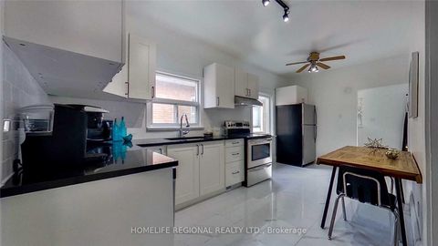 Photo 2 at 22 Criscoe Street, Smythe, Toronto