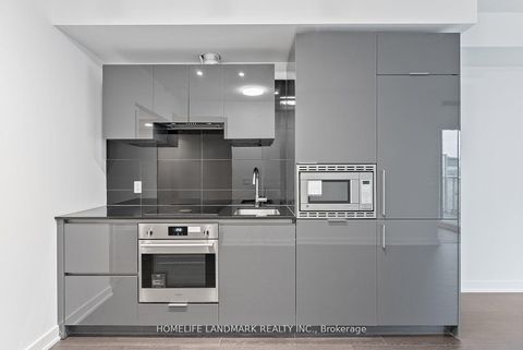 Photo 2 at 1129 - 230 Simcoe Street, Chinatown, Toronto