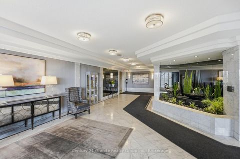 Photo 2 at 180 - 1 Greystone Walk Drive, Kennedy Park, Toronto