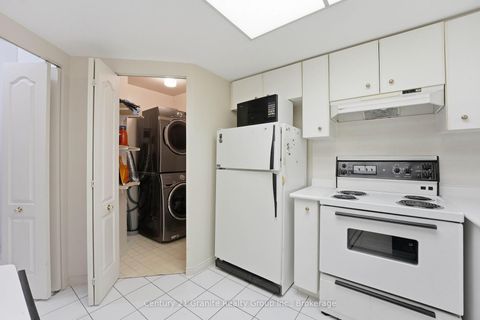 Photo 6 at 180 - 1 Greystone Walk Drive, Kennedy Park, Toronto