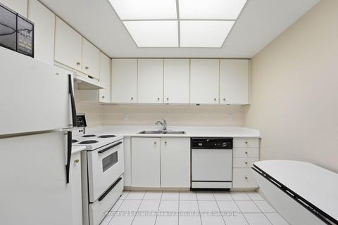 Photo 7 at 180 - 1 Greystone Walk Drive, Kennedy Park, Toronto