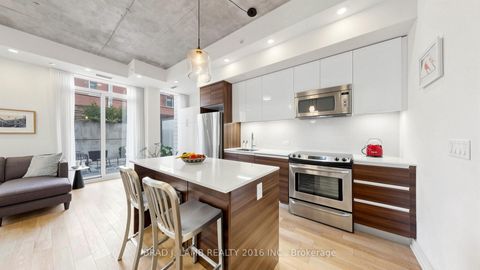 Photo 2 at TH102 - 1238 Dundas Street E, South Riverdale, Toronto