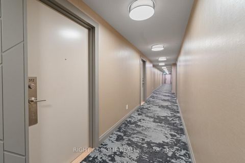 Photo 4 at 312 - 10 MEADOWGLEN Place, Woburn, Toronto