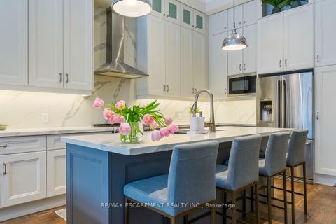 Photo 7 at 56 Laburnham Avenue, Long Branch, Toronto