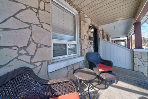 Photo 2 at 10 Eldon Avenue, Crescent Town, Toronto