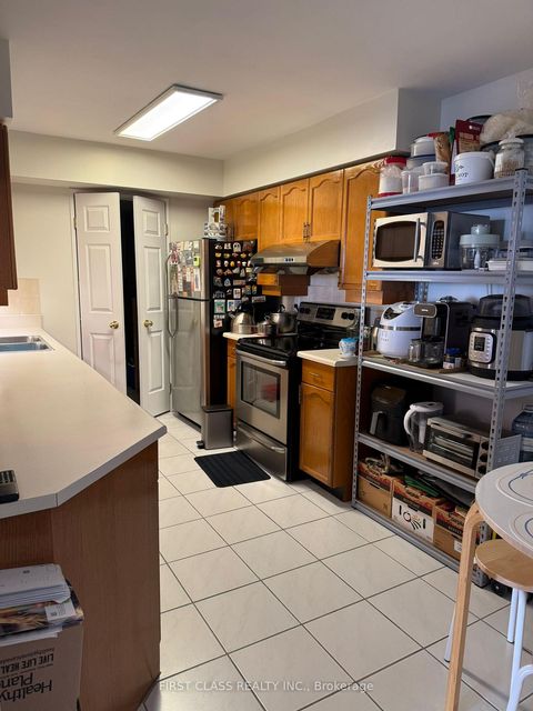 Photo 4 at 708 - 175 Bamburgh Circle, Steeles, Toronto