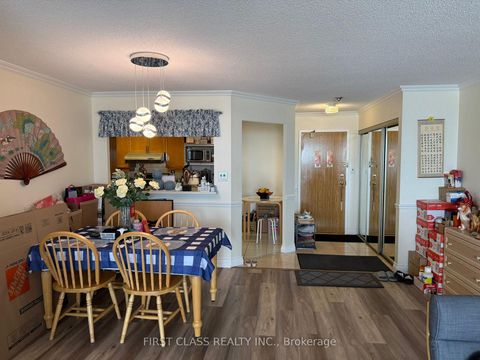 Photo 10 at 708 - 175 Bamburgh Circle, Steeles, Toronto