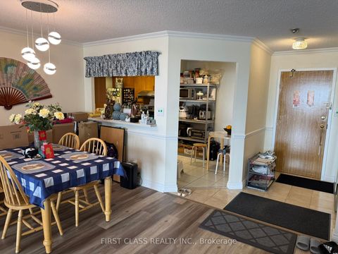 Photo 11 at 708 - 175 Bamburgh Circle, Steeles, Toronto