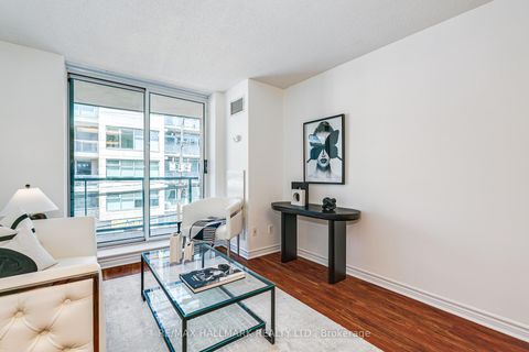 Photo 1 at 311 - 1863 Queen Street E, The Beaches, Toronto