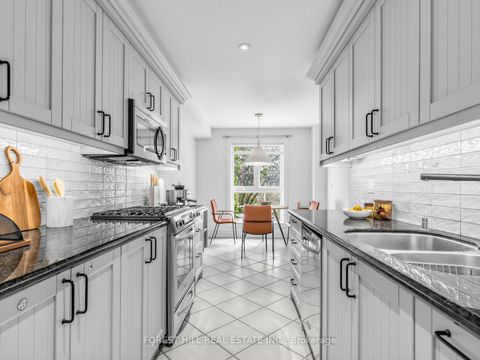 Photo 4 at 40 Snowshoe Mill Way, Windfields, Toronto